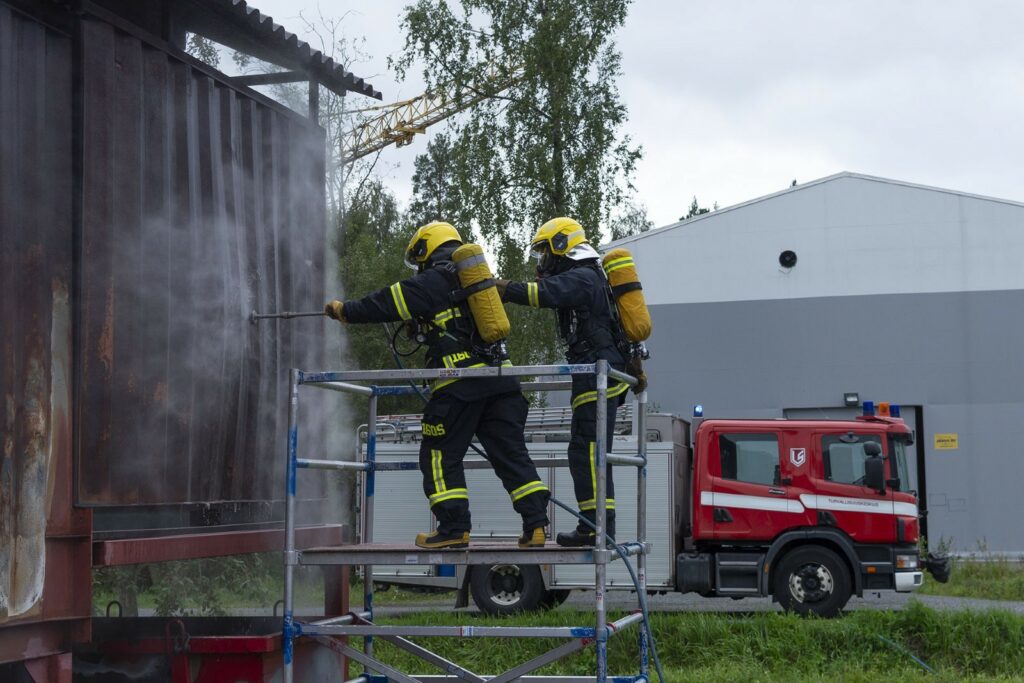 The HAC cutting through a metal container