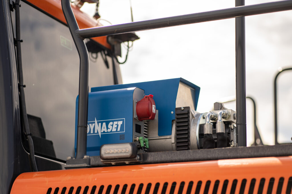 HMG PRO Hydraulic Magnet Generator installed on an excavator for magnet use