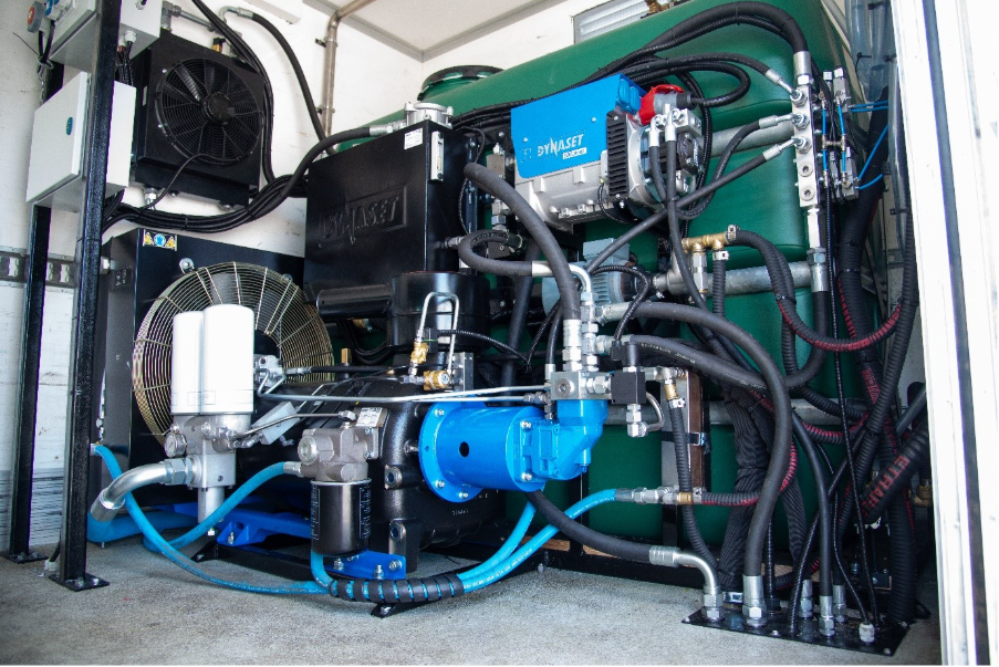 DYNASET HG Hydraulic Generator and HKR Hydraulic Screw Compressor in a mobile service vehicle