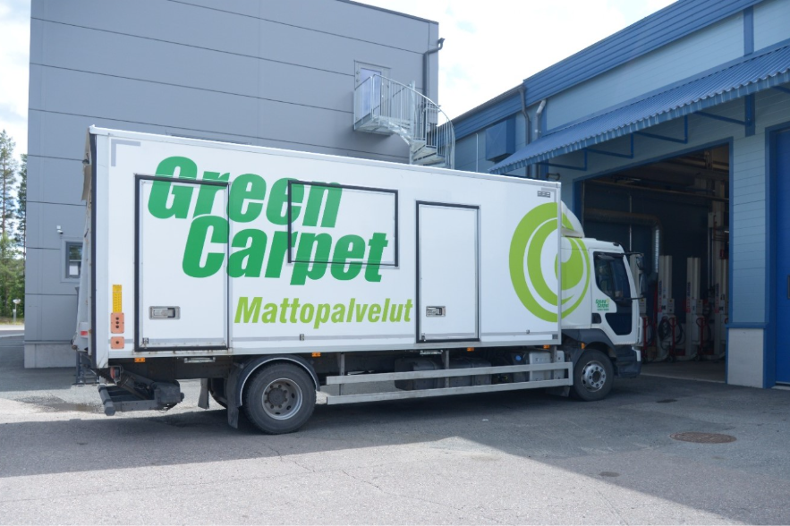 Green Carpet mobile carpet cleaning service vehicle equipped with DYNASET products